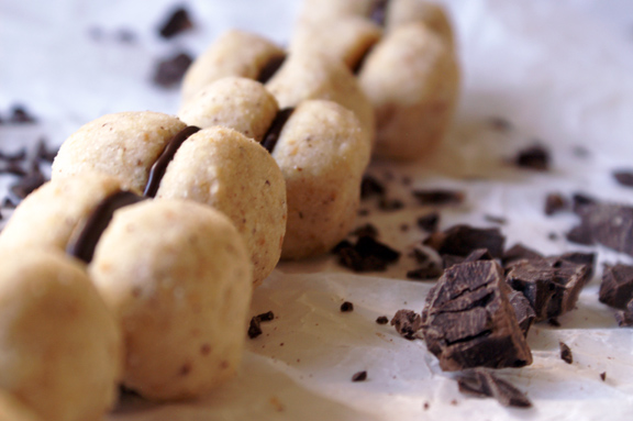 baci di dama [chocolate-filled hazelnut cookies].